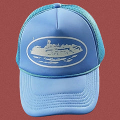 Corteiz Bold White Oval Ship Logo Trucker Hat - Light Blue